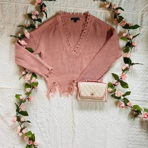 Pink knitted sweater